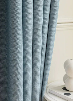 Blue curtain with thick chevron pattern