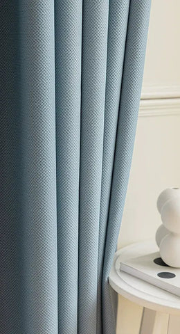 Blue curtain with thick chevron pattern