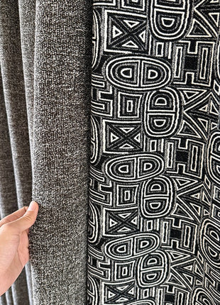 Bohemian curtain with black diamond pattern fringes