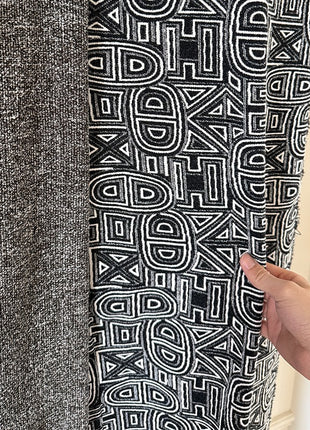 Bohemian curtain with black diamond pattern fringes