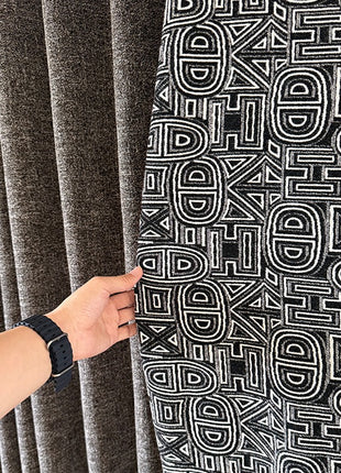 Bohemian curtain with black diamond pattern fringes